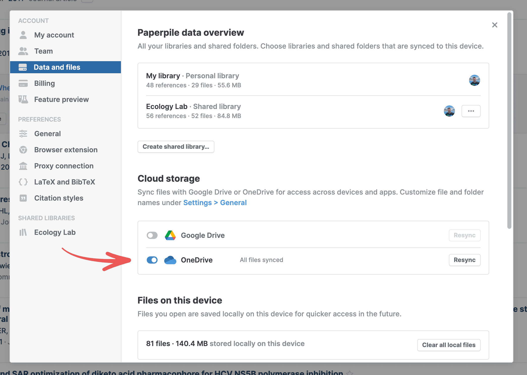 Settings › Data and files with a red arrow pointing to the OneDrive toggle under Cloud storage, switched on and reading “All files synced”, while the Google Drive toggle above it is off.